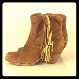Suede booties with fringe detail!